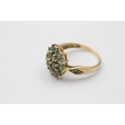 1128 - A 14ct gold green gemstone cluster dress ring - approx. gross weight 3.6 grams