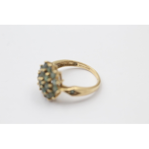 1128 - A 14ct gold green gemstone cluster dress ring - approx. gross weight 3.6 grams