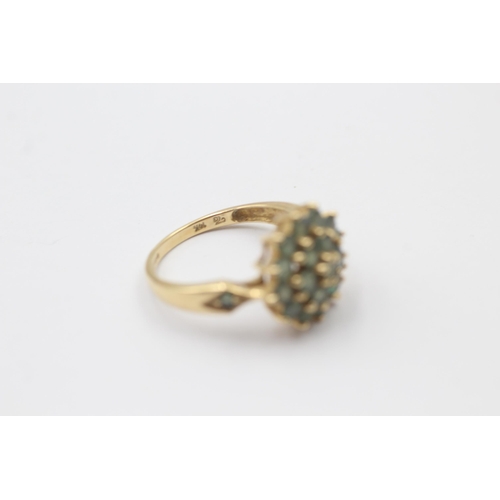 1128 - A 14ct gold green gemstone cluster dress ring - approx. gross weight 3.6 grams