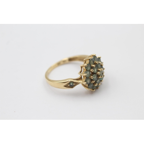 1128 - A 14ct gold green gemstone cluster dress ring - approx. gross weight 3.6 grams