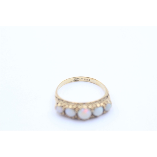 1130 - A 9ct gold opal five stone gypsy setting ring, size M - approx. gross weight 2.4 grams