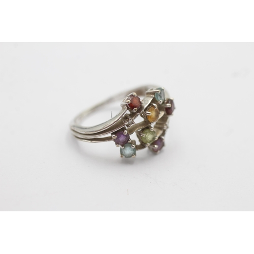 1131 - A 9ct white gold garnet, amethyst, citrine, topaz, peridot and diamond stylised floral ring - approx... 