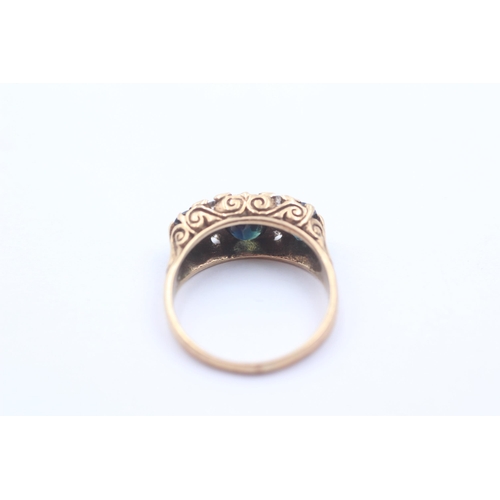 1132 - A 9ct gold sapphire and diamond gypsy setting ring - approx. gross weight 3.1 grams