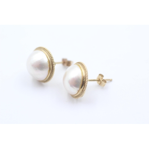 1137 - A pair of 9ct gold pearl statement earrings - approx. gross weight 3.4 grams