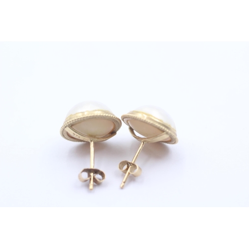 1137 - A pair of 9ct gold pearl statement earrings - approx. gross weight 3.4 grams