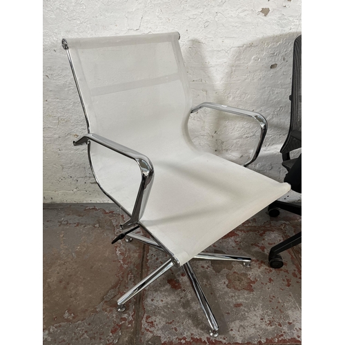 36 - Two modern swivel office desk chairs