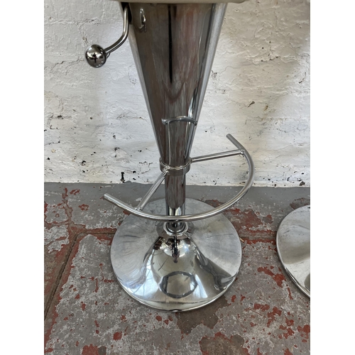 68 - A pair of modern cream leatherette and chrome plated kitchen barstools