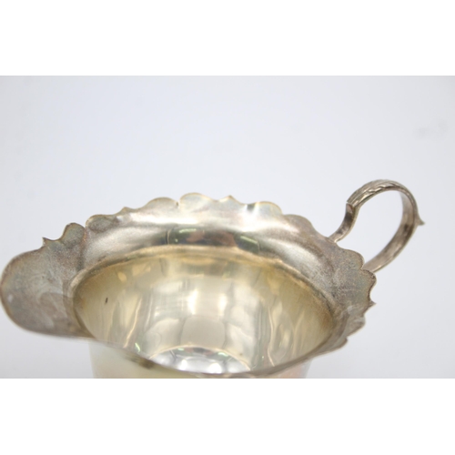 1261 - A Horace Woodward & Co. Ltd. hallmarked London silver cream jug, dated 1911 - approx. gross weight 4... 