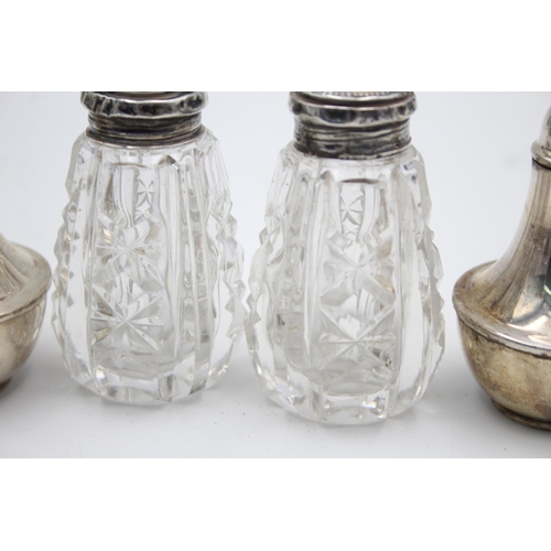 1263 - Four sterling silver salt and pepper shakers - approx. gross weight 232 grams including glass