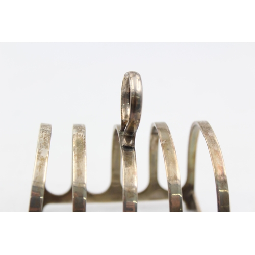 1268 - A George V Adie Brothers Ltd. hallmarked Birmingham silver five bar toast rack, dated 1936 - approx.... 