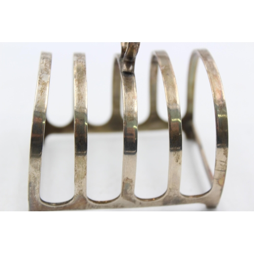 1268 - A George V Adie Brothers Ltd. hallmarked Birmingham silver five bar toast rack, dated 1936 - approx.... 