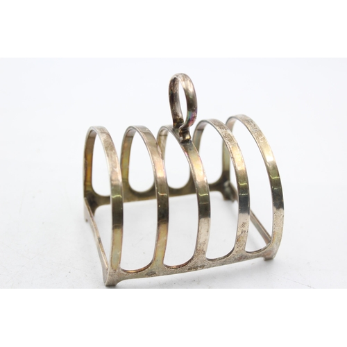 1268 - A George V Adie Brothers Ltd. hallmarked Birmingham silver five bar toast rack, dated 1936 - approx.... 