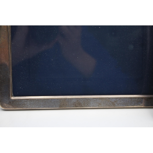 1270 - Two hallmarked .925 silver photo frames - approx. gross weight 849 grams