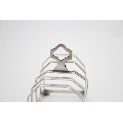 1287 - A Viners hallmarked Sheffield silver five bar toast rack, dated 1932 - approx. gross weight 55 grams