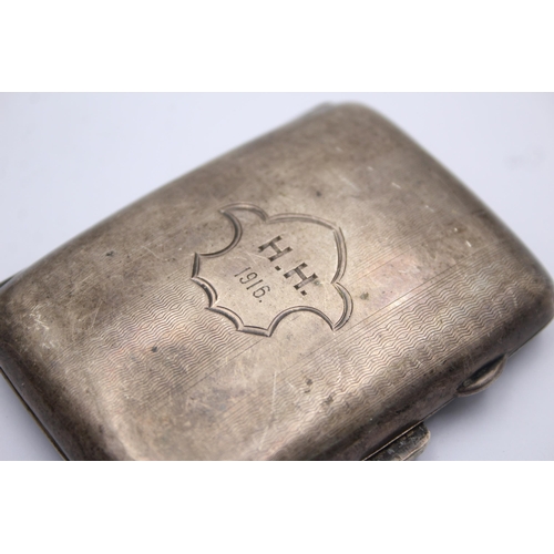 1298 - An Edwardian J Gloster Ltd. hallmarked Birmingham silver cigarette case, dated 1914 - approx. gross ... 