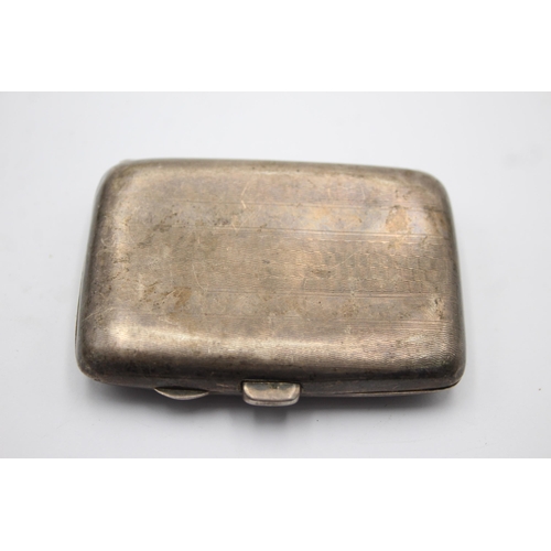 1298 - An Edwardian J Gloster Ltd. hallmarked Birmingham silver cigarette case, dated 1914 - approx. gross ... 