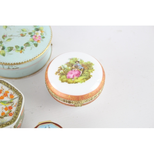 257 - A collection of ceramic and enamel trinket/pill boxes to include Halcyon Days etc.