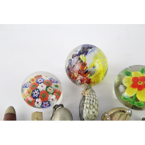 260 - A collection of vintage paperweights and letter openers to include Millefiori etc.