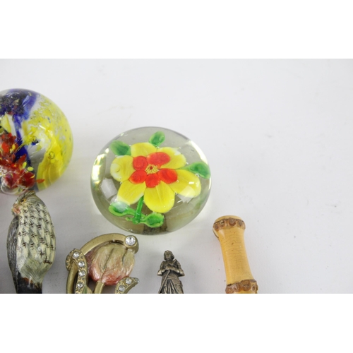 260 - A collection of vintage paperweights and letter openers to include Millefiori etc.