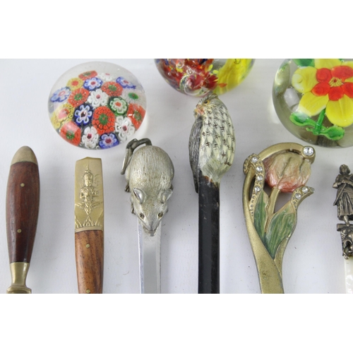 260 - A collection of vintage paperweights and letter openers to include Millefiori etc.