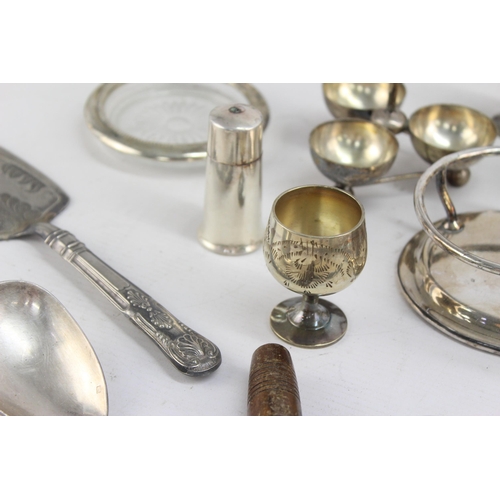 332 - A collection of metalware to include silver plate, Walker & Hall etc.