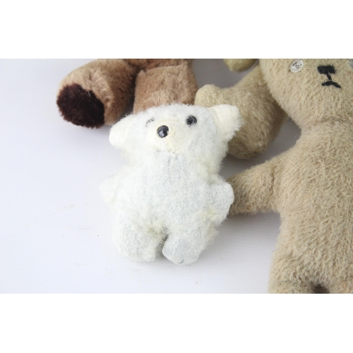 359 - Eight vintage stuffed toys to include hand puppet, mohair etc.