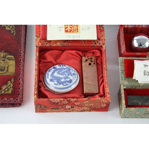 438 - A collection of Oriental desk accessories to include abacus etc.