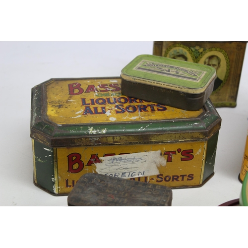 439 - A collection of vintage collectable tins to include Royal, Basset's etc.