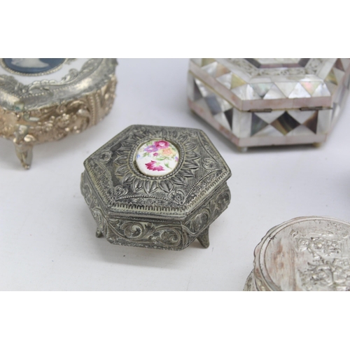 440 - A collection of vintage storage boxes to include mother of pearl trinket box etc.