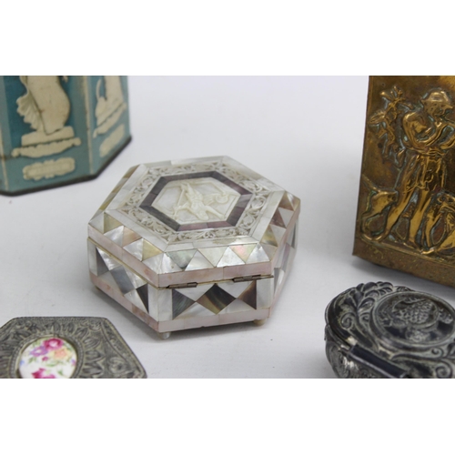 440 - A collection of vintage storage boxes to include mother of pearl trinket box etc.