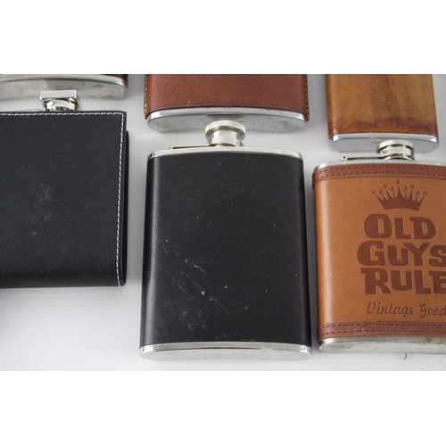 464 - A collection of vintage hip flasks to include leather, pewter etc.