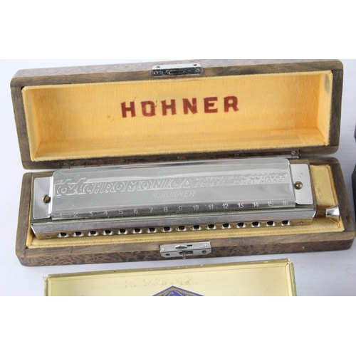 487 - Four vintage boxed M. Hohner harmonicas