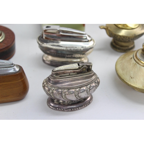 488 - A collection of vintage table lighters to include Ronson etc.