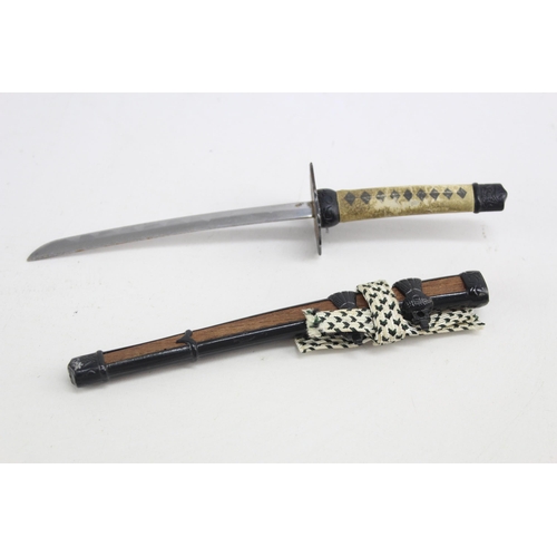 490 - Two vintage novelty sword letter openers