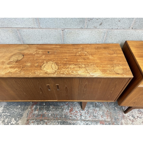 10 - A 1960s G Plan teak sideboard with four drawers and two cupboard doors