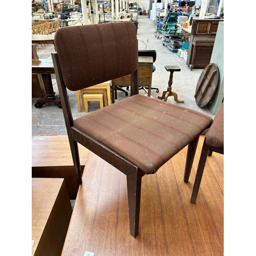 100 - A Meredew teak rectangular extending table and four matching dining chairs