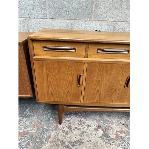 11 - A 1960s G Plan Fresco teak sideboard with three drawers and four cupboard doors