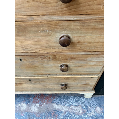 122 - A Victorian pine chest of two short over three long drawers with bracket supports