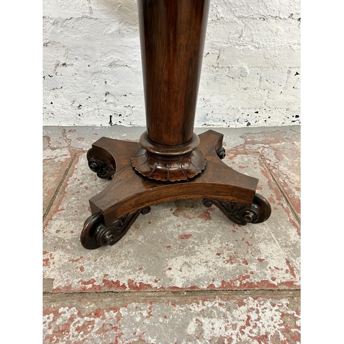 127 - A William IV rosewood fold over tea table on quatrefoil base