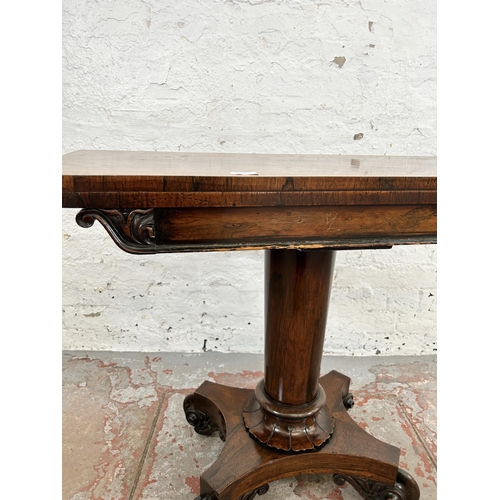 127 - A William IV rosewood fold over tea table on quatrefoil base