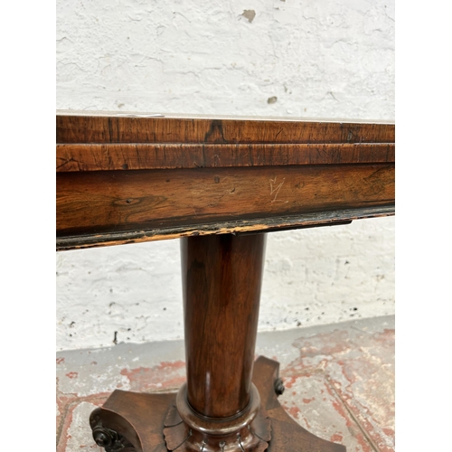 127 - A William IV rosewood fold over tea table on quatrefoil base