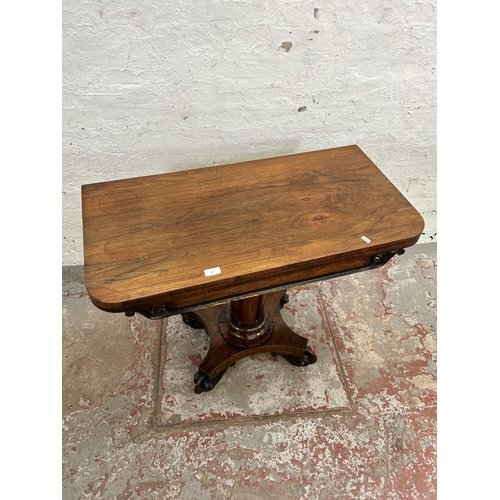 127 - A William IV rosewood fold over tea table on quatrefoil base