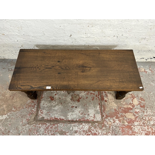 137 - A 17th century style solid oak rectangular coffee table