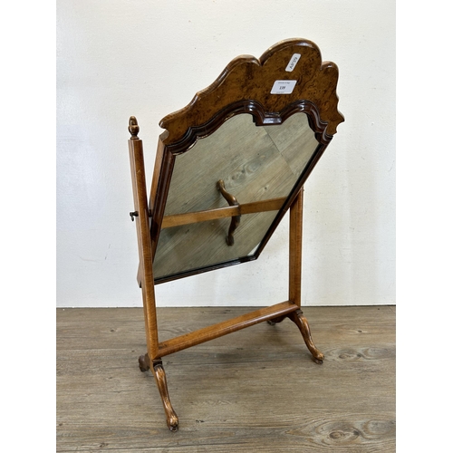 139 - A 19th century style burr walnut dressing table mirror