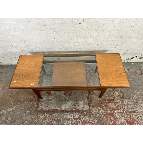 16 - A 1960s G Plan Fresco teak two tier rectangular coffee table with glass insert