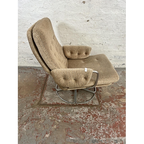 25 - A 1970s fabric upholstered and chrome plated tubular metal swivel armchair attributed to Terence Con... 