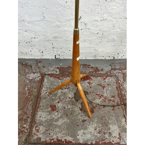 40 - A 1960s beech and brass effect tripod standard lamp