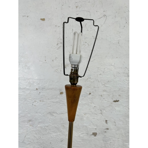 40 - A 1960s beech and brass effect tripod standard lamp