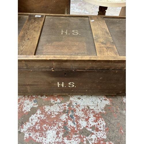 46 - A 19th century style pine and metal banded travel trunk monogrammed H. S.