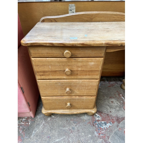 48 - A pine dressing table with four drawers